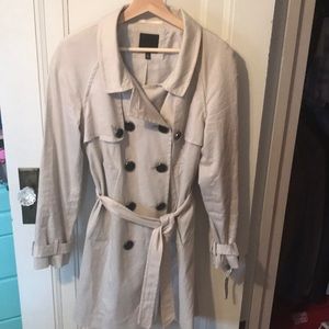 The limited cream trench coat size M.